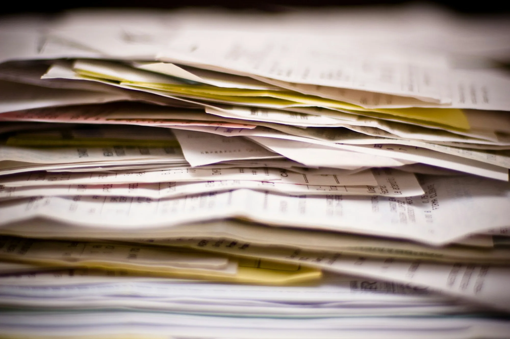 Close-up of a messy stack of papers